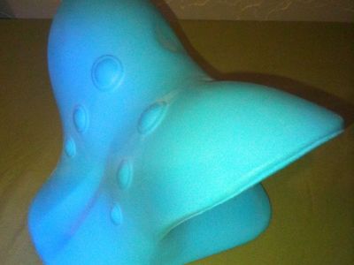 Cervical Traction Pillow or Neck Stretcher.