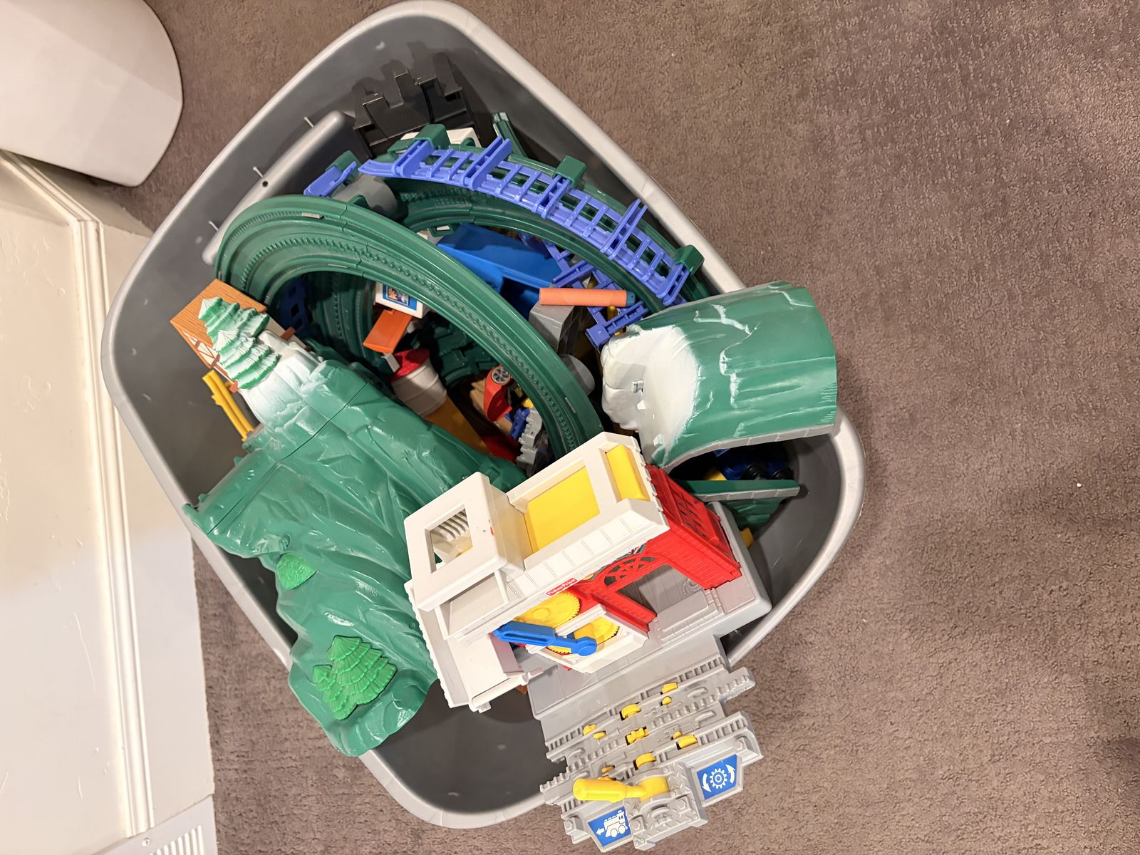 Big box of Geo Trax trains