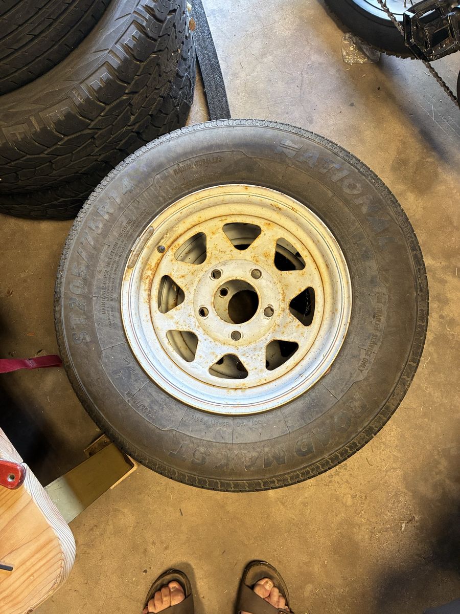 Hard to find trailer wheels (2) 5 on 5! Lug pattern yep you hear right 5on5  with good tires.