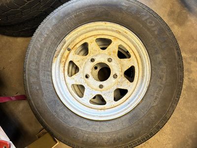 Hard to find trailer wheels (2) 5 on 5! Lug pattern yep you hear right 5on5 with good tires.