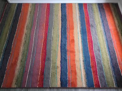 Area Rug with Underlay. 7.75' x 10.9'