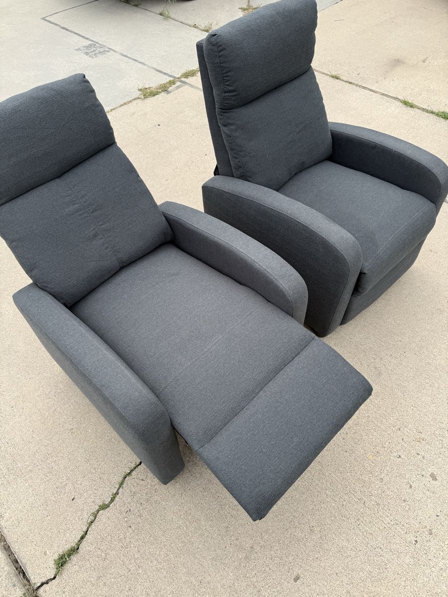 Pair of grey manual recliner chairs