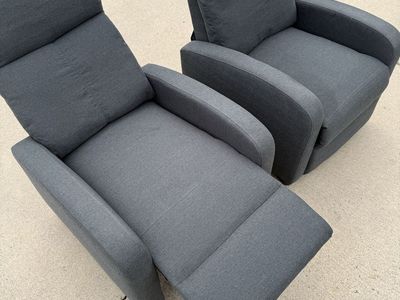 Pair of grey manual recliner chairs