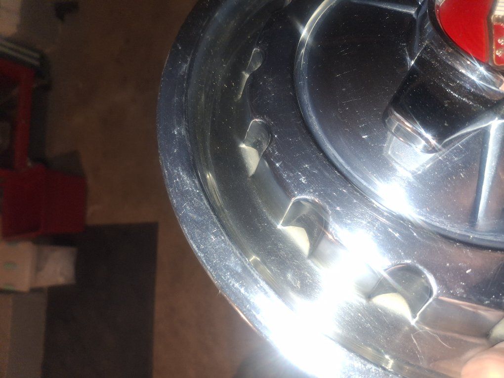 1957 original hub caps set of 4 in very good shape