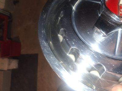 1957 original hub caps set of 4 in very good shape