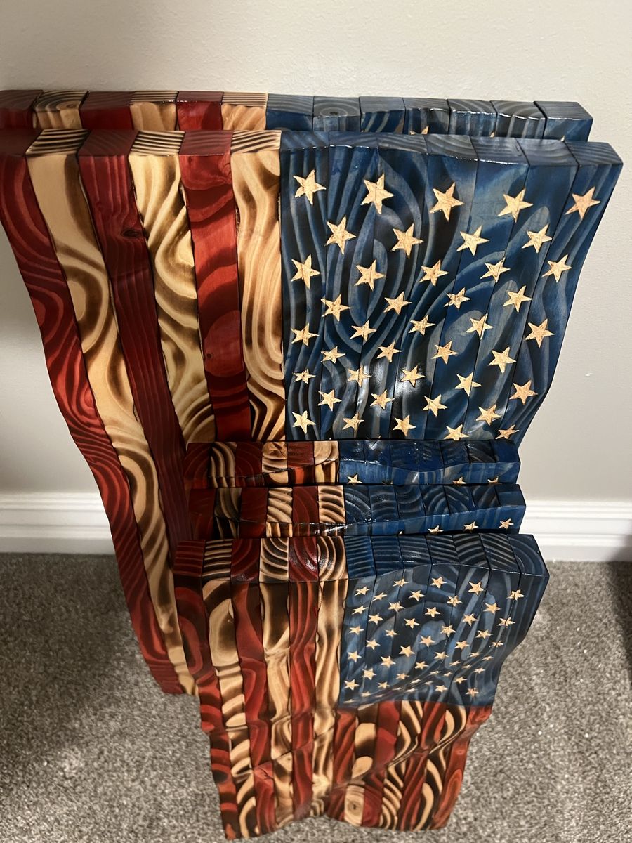 Hand carved wavy wood flags
