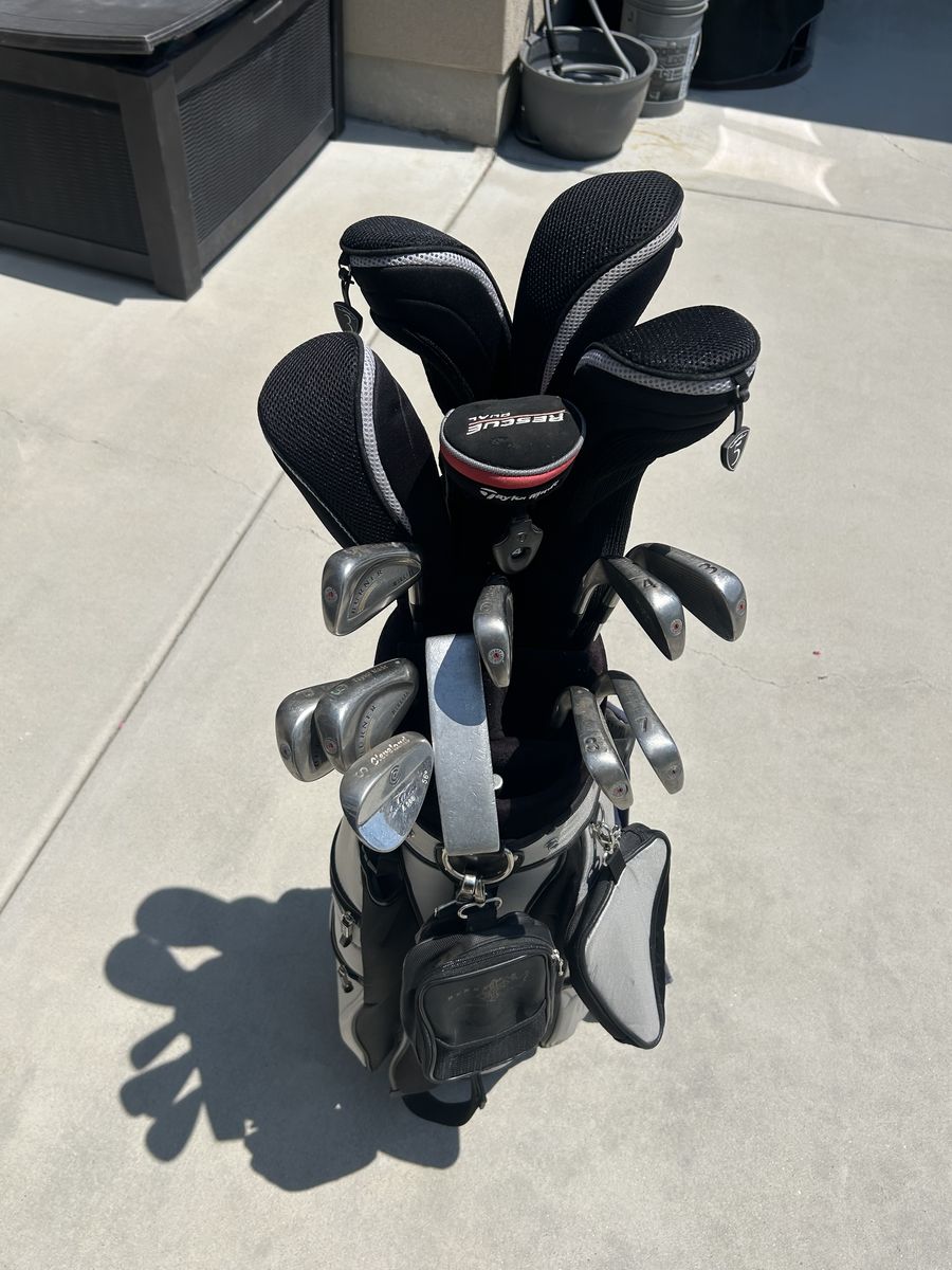 Taylormade Irons & assorted fairway woods with Mizuno Bag