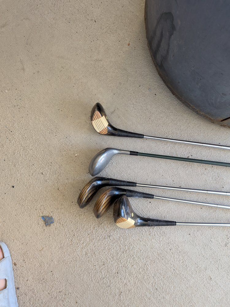 golf clubs and shoes