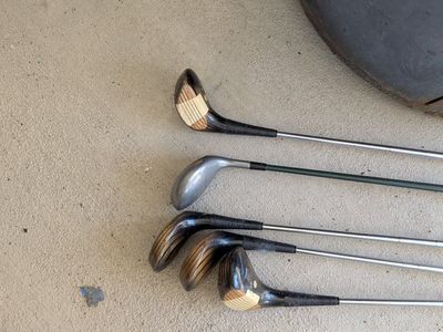 golf clubs and shoes
