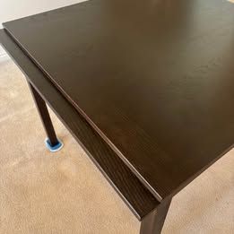 Solid Teak Dining Table with attached hidden leaves.