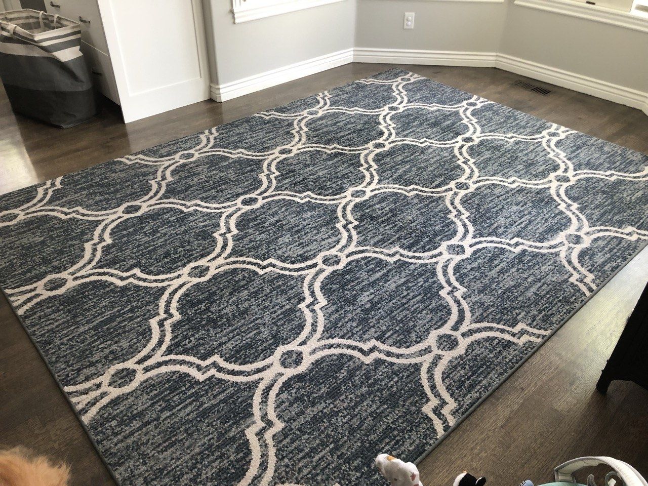 Blue and white area rug- 122” x 89.5”