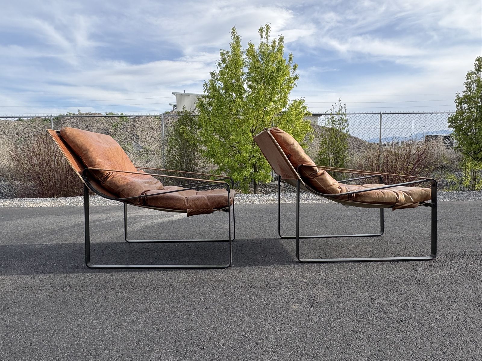 Beautiful genuine leather accent chairs.  Down filled cushions. Orig over $1,400 each new  Great for Mid Century Modern MCM