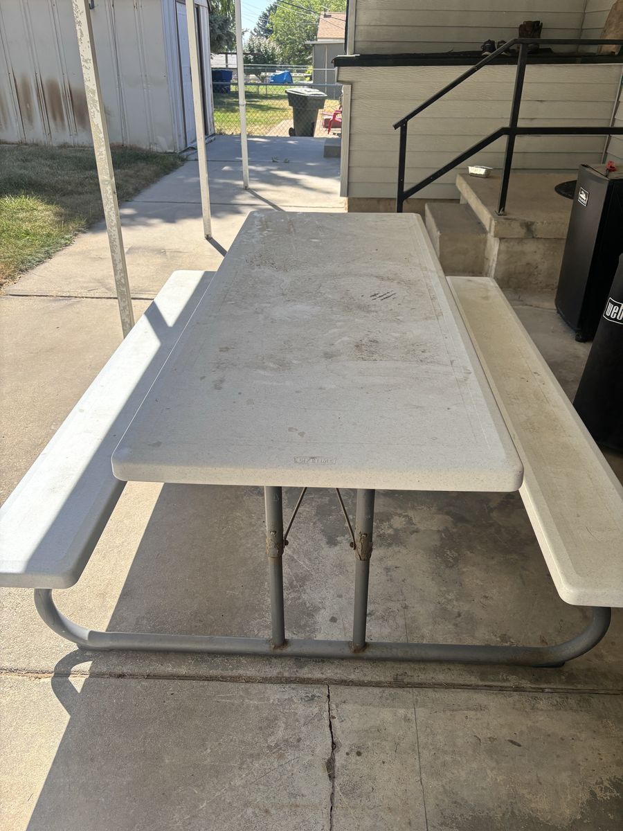 Used Lifetime White Plastic Folding Picnic Table with Attached Benches