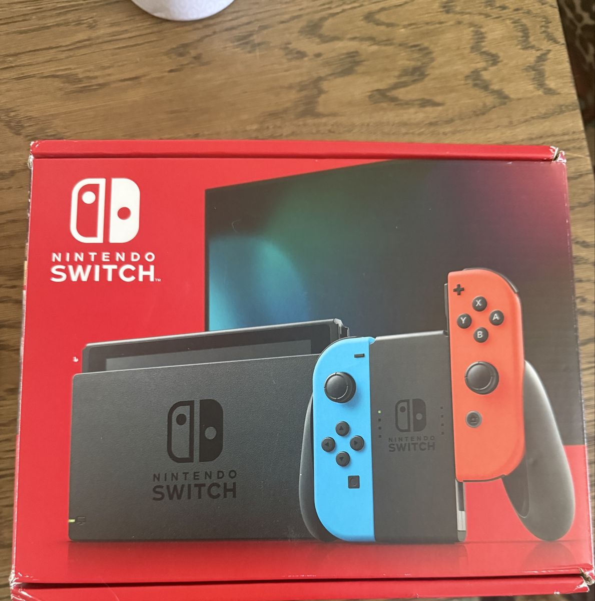 Nintendo Switch Console v2 with Neon Red & Blue Joy-Cons, Dock, Charger, and Super Smash Bros. Ultimate