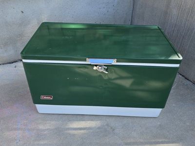 vintage green Coleman metal cooler