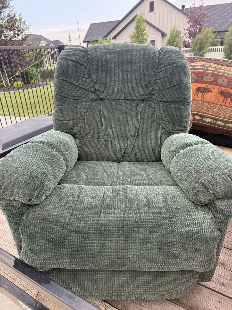 Dark green recliner chair