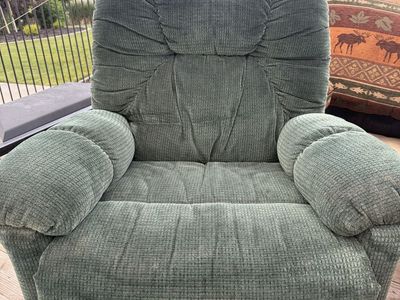 Dark green recliner chair