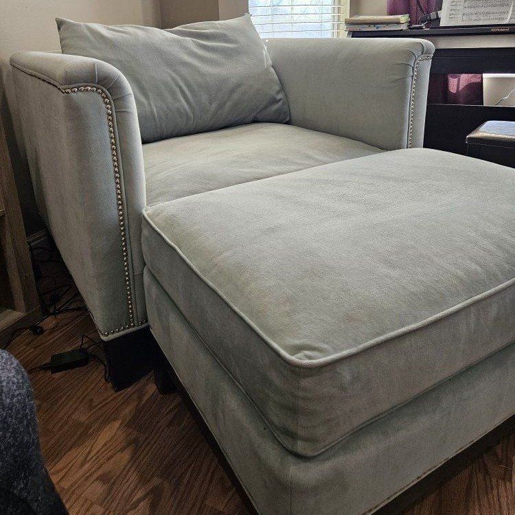 comfortable oversized turquoise chair and ottoman