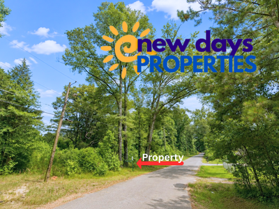 0.14 Acres of Peace, Privacy & Investment Potential!