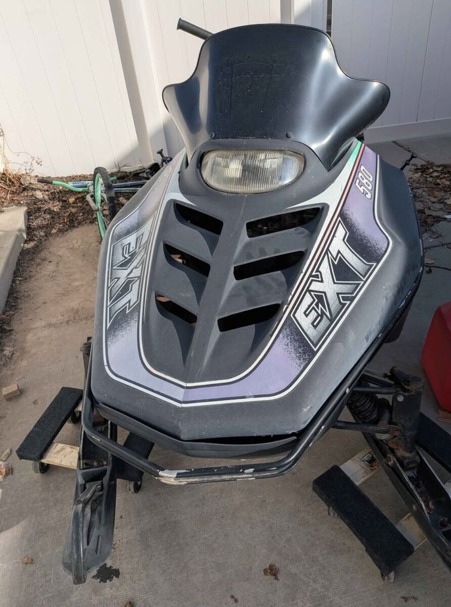 two 1995 arctic cat snowmobiles