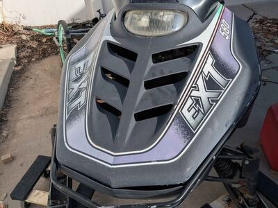 two 1995 arctic cat snowmobiles