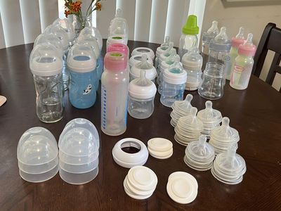 Assorted Glass and Plastic Baby Bottles: anti-colic, Philips Avent, Mam, Dr. Browns, Chicco