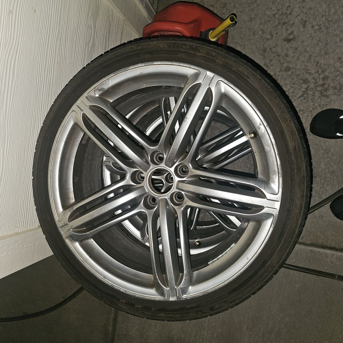 3 aluminum wheels and tires.