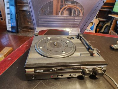 Jensen Model JTA-230 record turntable. Works and sounds great. Looks cool. Needle is excellent.