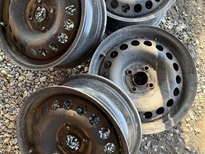 Set of 4 OEM GM 15" 4-Lug Steel Wheels Rims with TPMS Sensors (4x100)