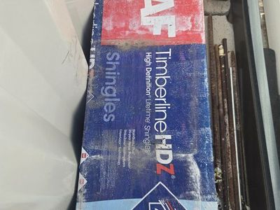 8 full bundles of GAF Timberline HDZ High Definition Lifetime Shingles (Bundle) & Coil Nails, and flashing.