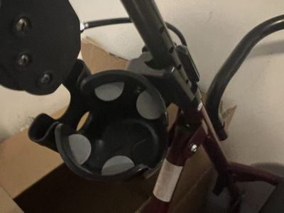 Red Rollator Walker with Seat, Storage Bag, and Cup Holder