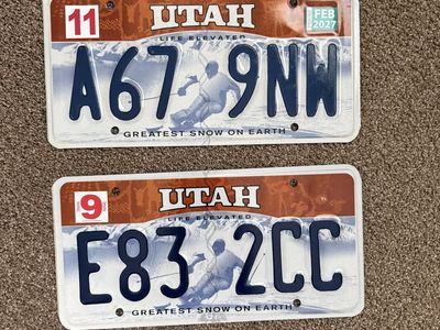 Lot of 2 LE Skier Utah License Plates