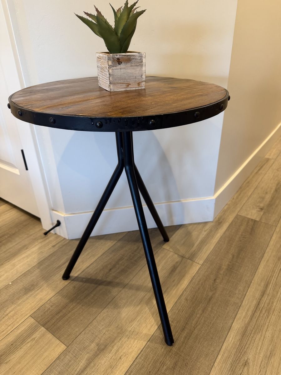 Rustic Industrial Round Wood End Table with Black Metal Tripod Legs and Rivet Details