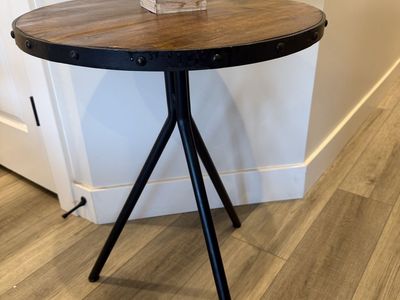 Rustic Industrial Round Wood End Table with Black Metal Tripod Legs and Rivet Details