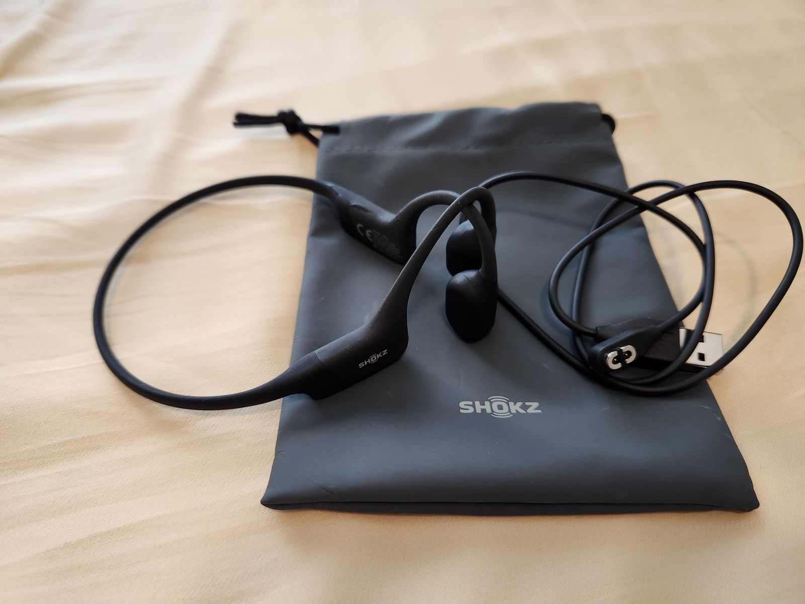 AfterShokz OpenRun lightweight, open-ear bone conduction sports headphones