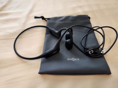 AfterShokz OpenRun lightweight, open-ear bone conduction sports headphones