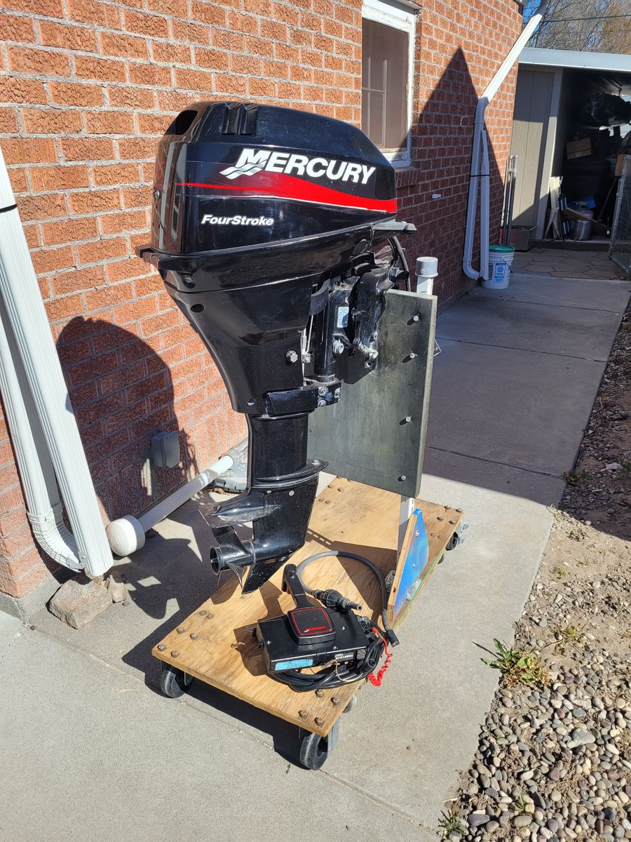 2004 Mercury Four Stroke 15 hp remote  control outboard motor