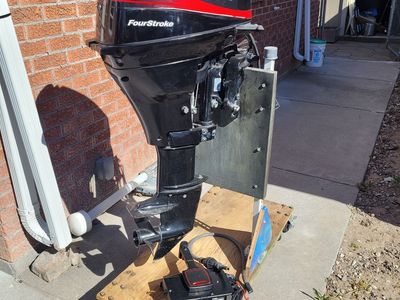 2004 Mercury Four Stroke 15 hp remote control outboard motor
