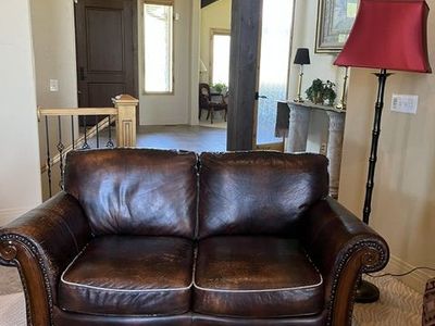 Distressed Brown Leather Loveseat - Classic Style, Nailhead Trim, Wood Frame