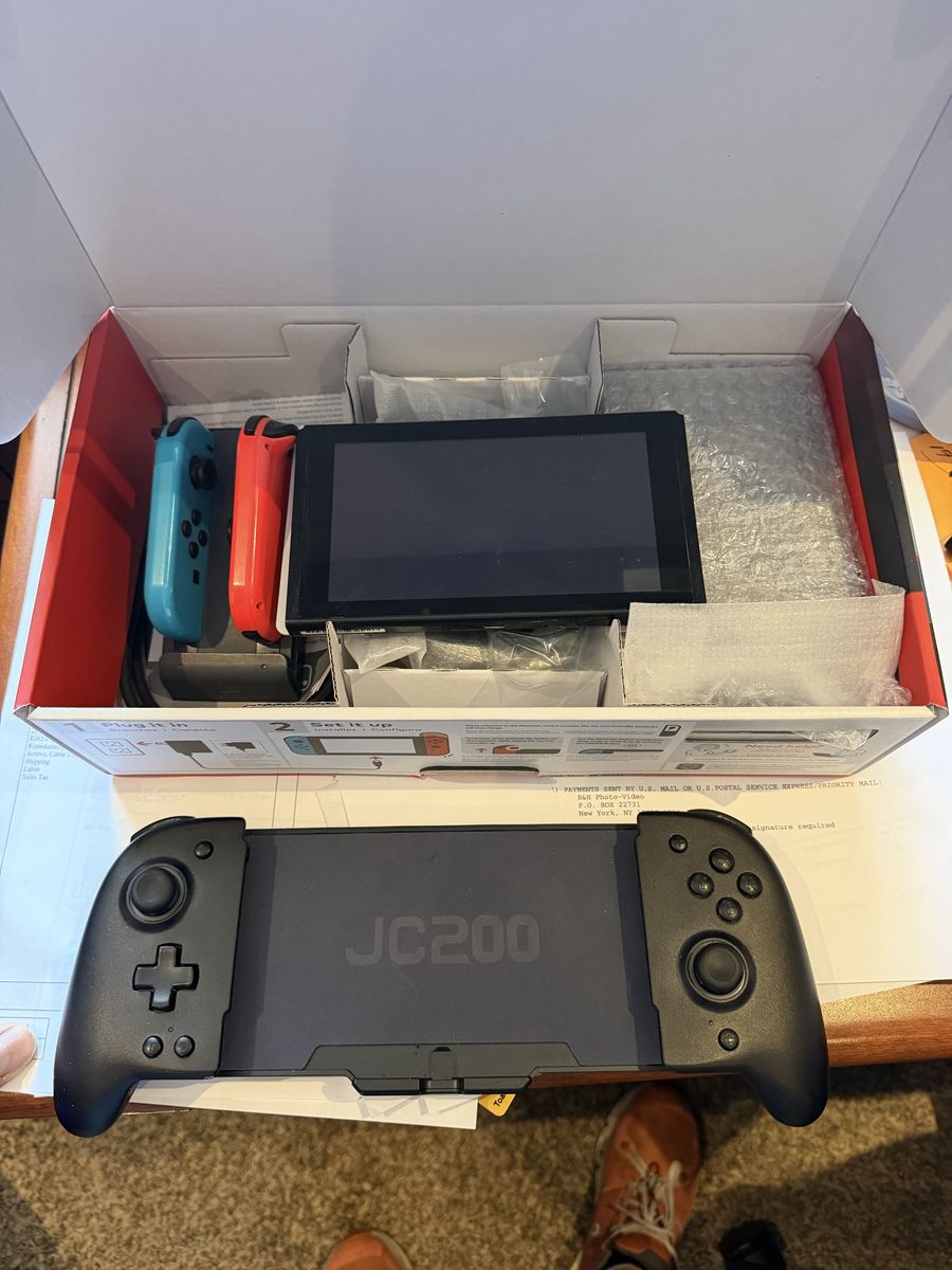 Nintendo Switch Console with Joy-Cons and JC200 Controller - Original Box Included with a extra large controller and charger