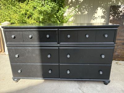 Black Double Dresser with Six Drawers and Round Knobs