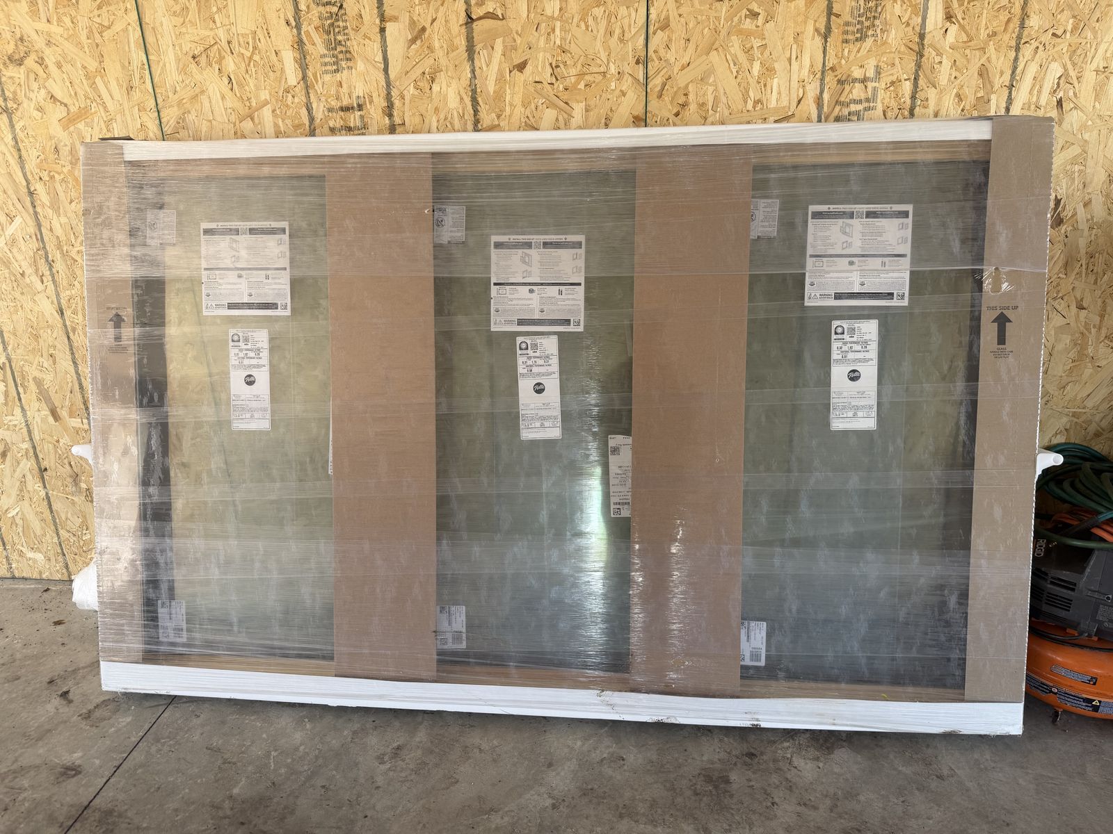 Pella exterior window with 2 side opening windows 87” x 53”
