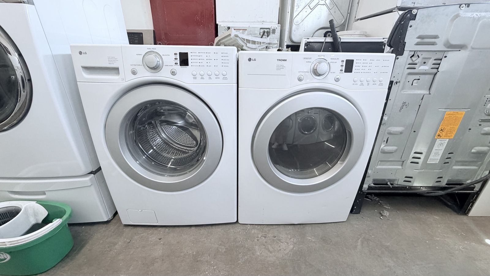LG White Front Load Washer & DLE2516W 7.3 cu. ft. White Electric Dryer
