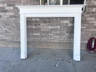 White painted fireplace mantel