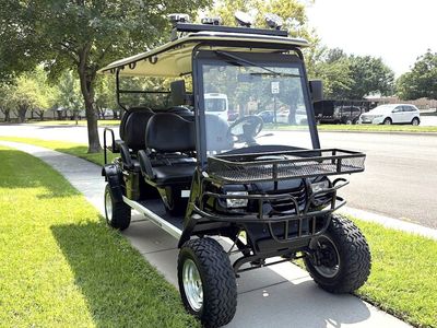 6-passenger 2018 Moto Electric LSV featuring a brand-new Eco Battery lithium, custom roof light rack