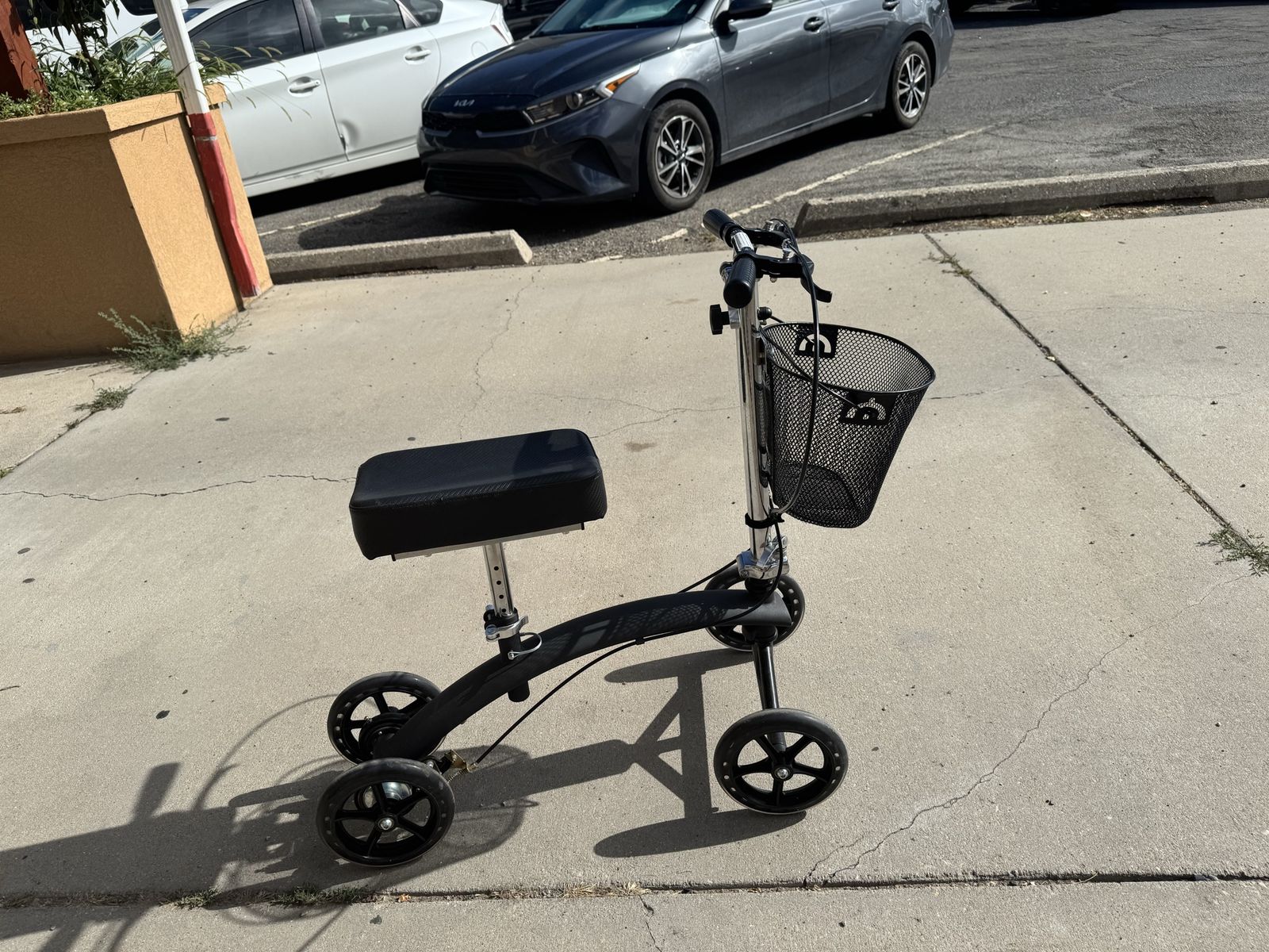 Black and Chrome Steerable Knee Scooter with Front Basket