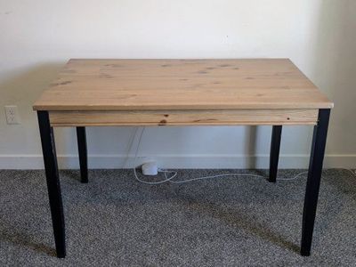 Table - brown with black legs