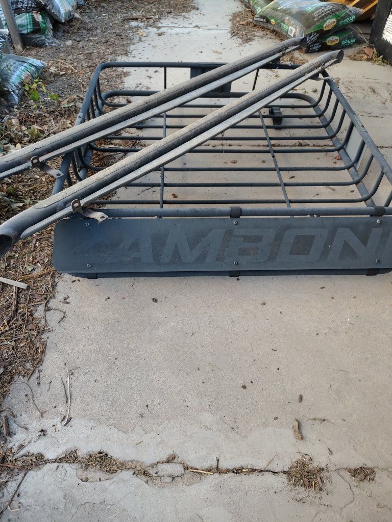 Black Steel Roof Rack Cargo Basket with nerf bars. Make an offer