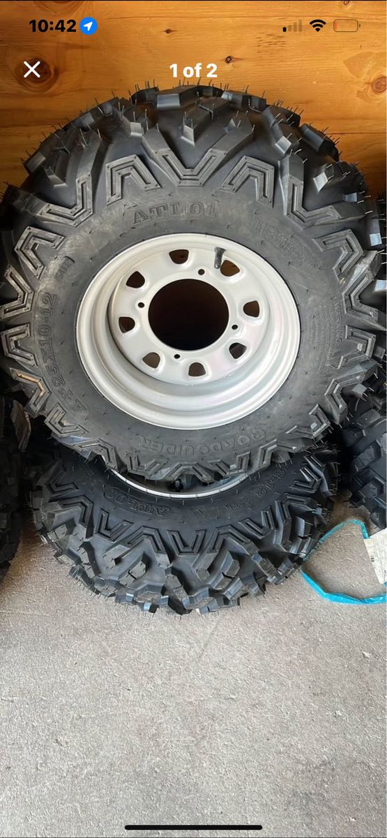 25X10-12 NEW PAIR OF ROAD GUIDER TIRES W/WHEELS