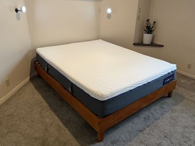 Queen mattress and wood bed frame. NEW!